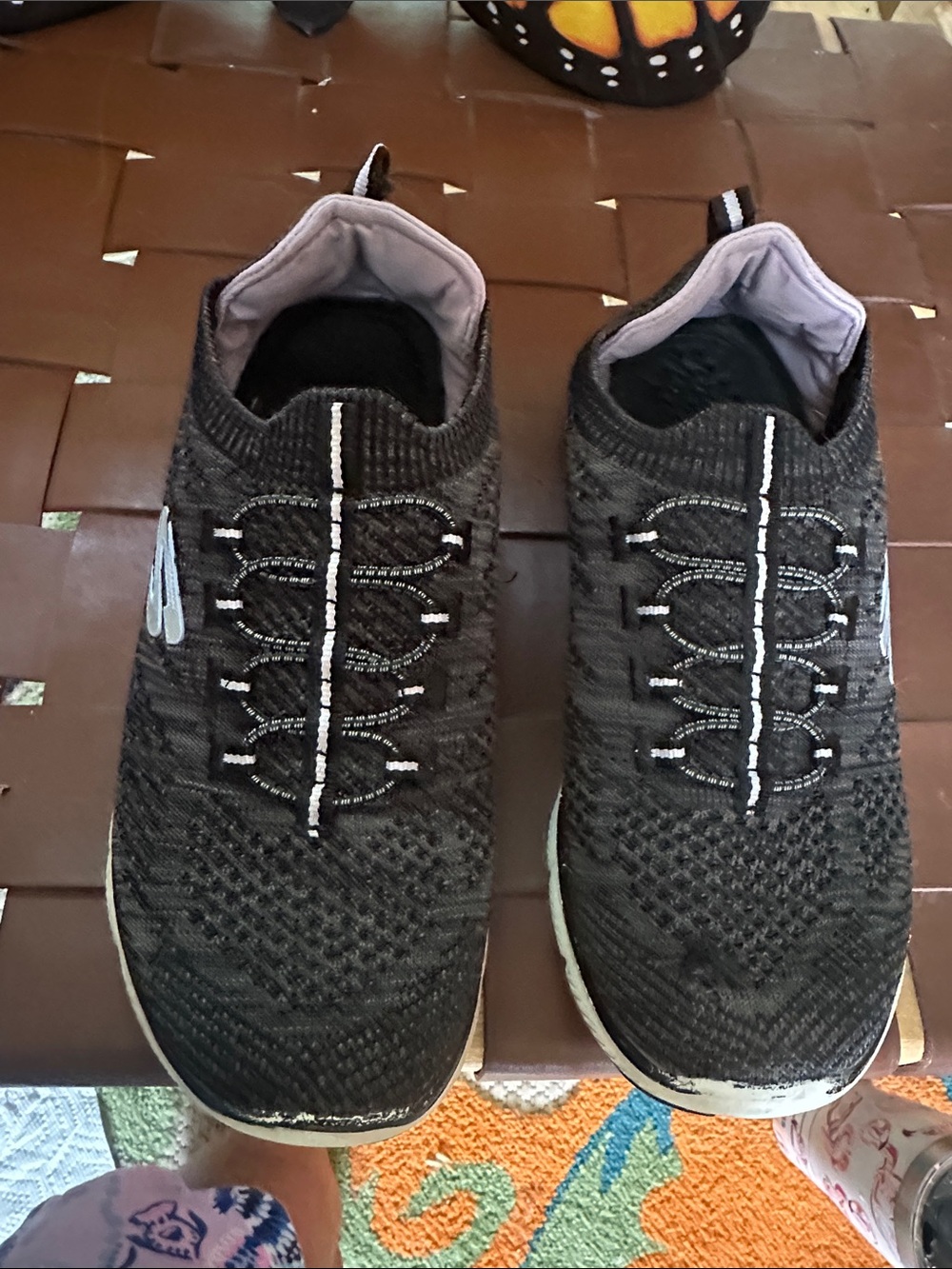 Skechers Black Knit Slip-On Sneakers with White Soles